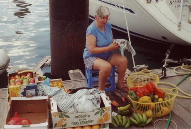 Ann cleaning all the fruit before loading